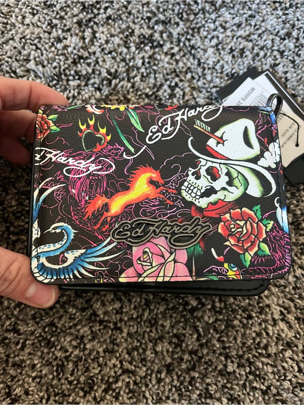 Ed Hardy wallet with a crossbody strap